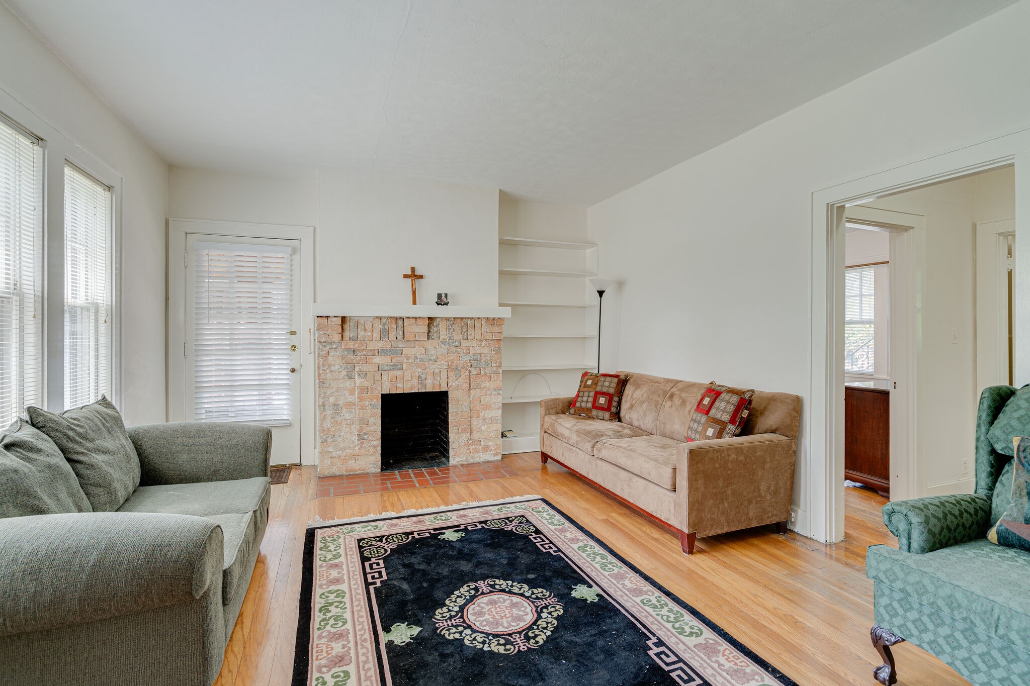 233 Cherokee Road Nashville, TN 37205 - Photo 6 of 29 a living room with furniture and a fireplace