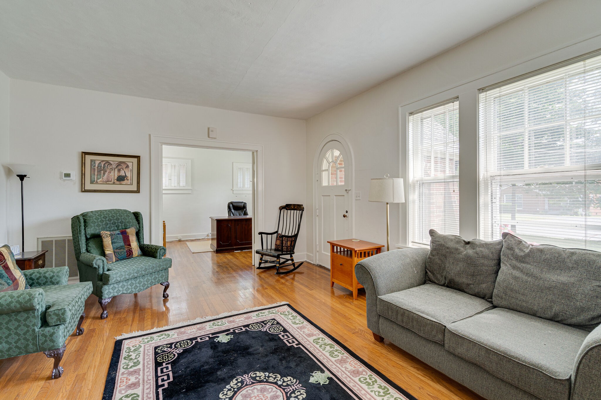 233 Cherokee Road Nashville, TN 37205 - Photo 8 of 29 a living room with furniture windows and a table