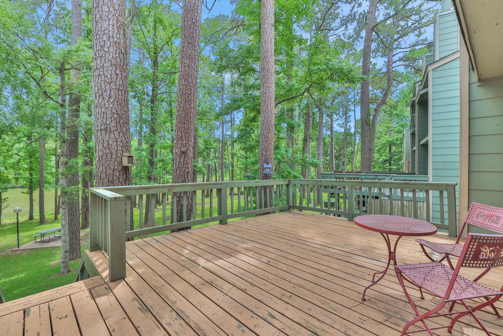 142 Villa Way Coldspring, TX 77331 - Photo 3 of 35 You will enjoy relaxing on your back deck overlooking the lagoon