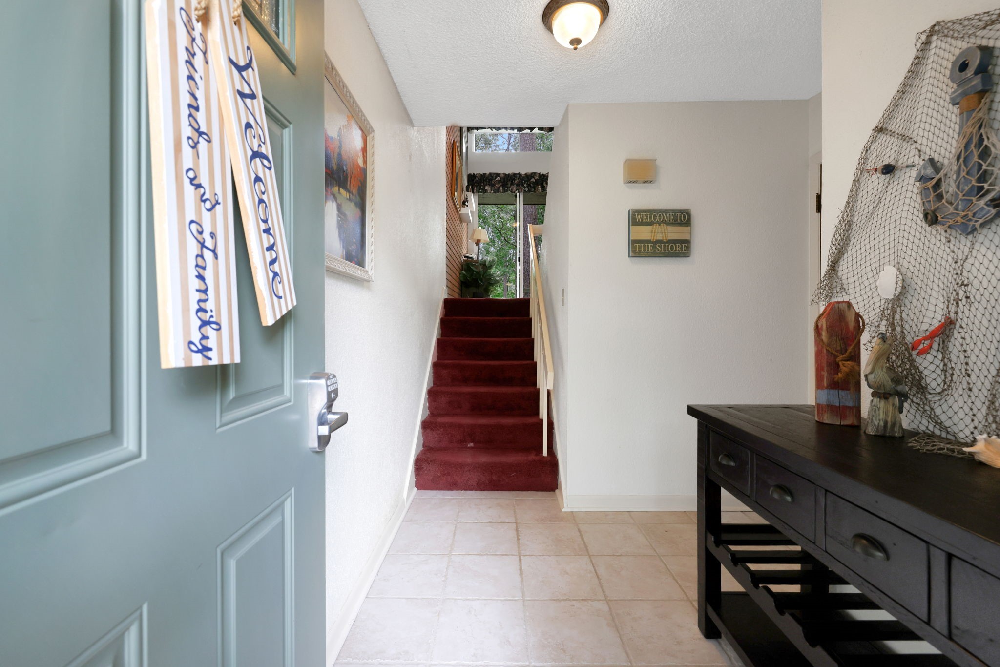 142 Villa Way Coldspring, TX 77331 - Photo 4 of 35 Welcome into this inviting foyer on first floor