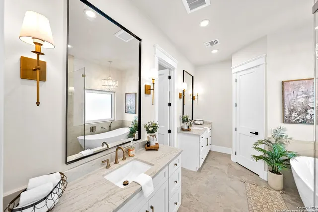 a white bath tub sitting in a bathroom
