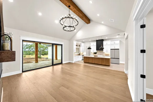 a kitchen with a sink stainless steel appliances and cabinets