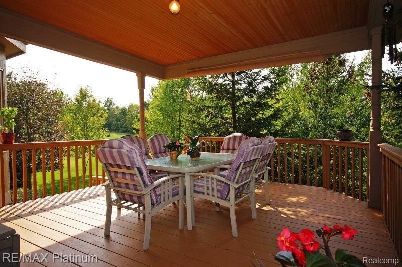 8619 Webster Hills Road Dexter, MI 48130 - Photo 24 of 25 Covered Deck - Overlooks Yard!