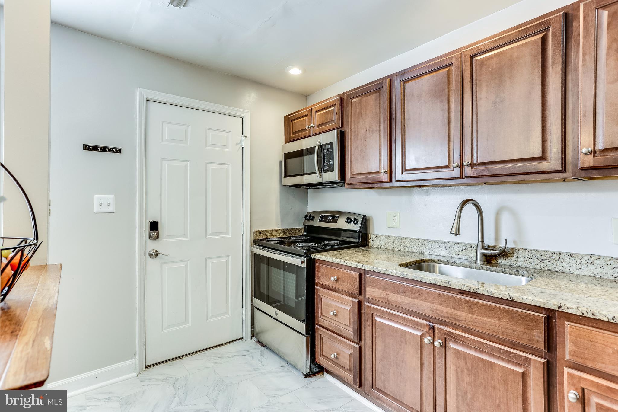 249 Stemmers Run Road Baltimore, MD 21221 - Photo 8 of 30 Kitchen with Granite Countertop