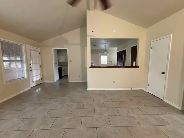 a view of a livingroom with a staircase
