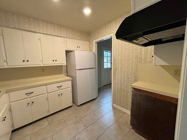 a utility room with a sink washer and dryer