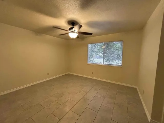 a bathroom with a double vanity sink and mirror