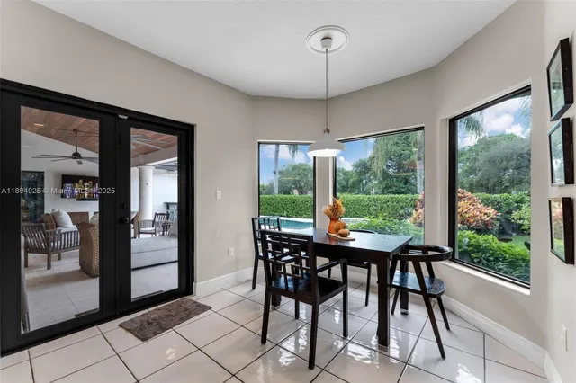a bedroom with furniture and a wooden floor