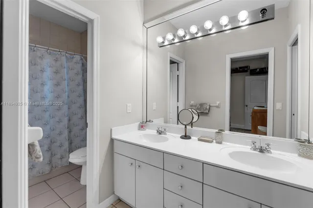 a bathroom with a bathtub and a sink