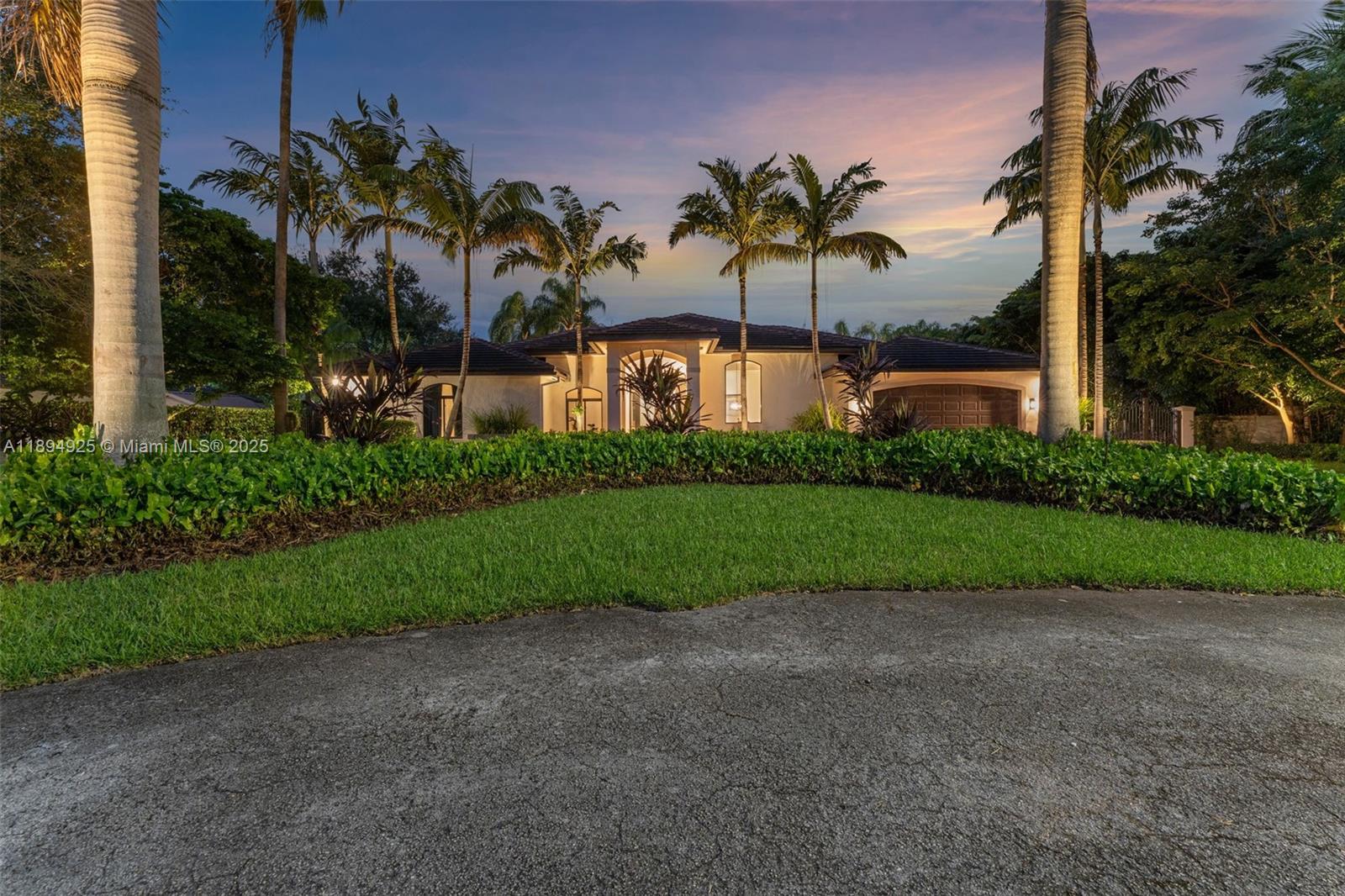 12019 Southwest 77th Terrace Miami, FL 33183 - Photo 57 of 67 a view of a palm trees next to a yard