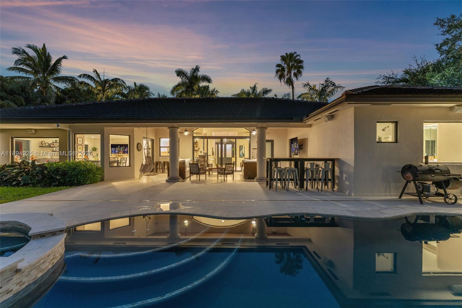 12019 Southwest 77th Terrace Miami, FL 33183 - Photo 61 of 67 a swimming pool view with a seating space