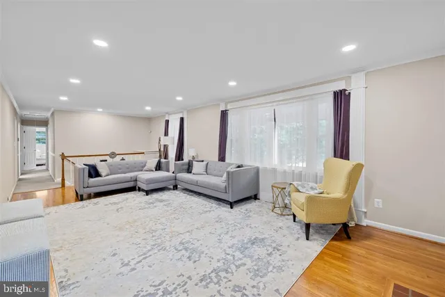 a living room with furniture and a couch