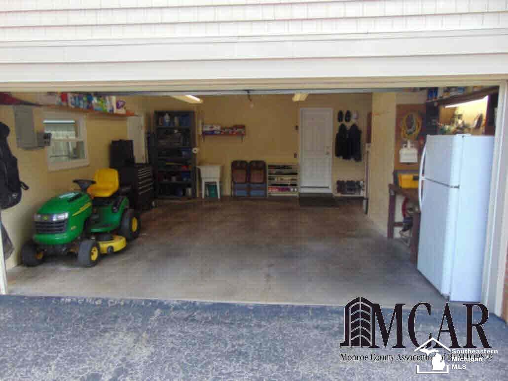 7604 Apache Trail Temperance, MI 48182 - Photo 23 of 32 Large, Clean Garage