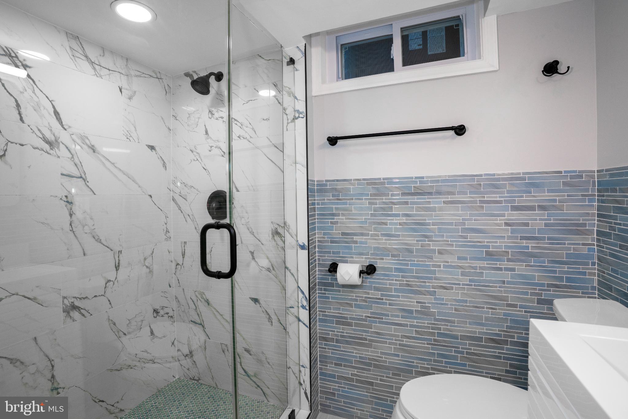 2652 Cory Terrace Silver Spring, MD 20902 - Photo 14 of 33 a bathroom with a toilet sink and shower