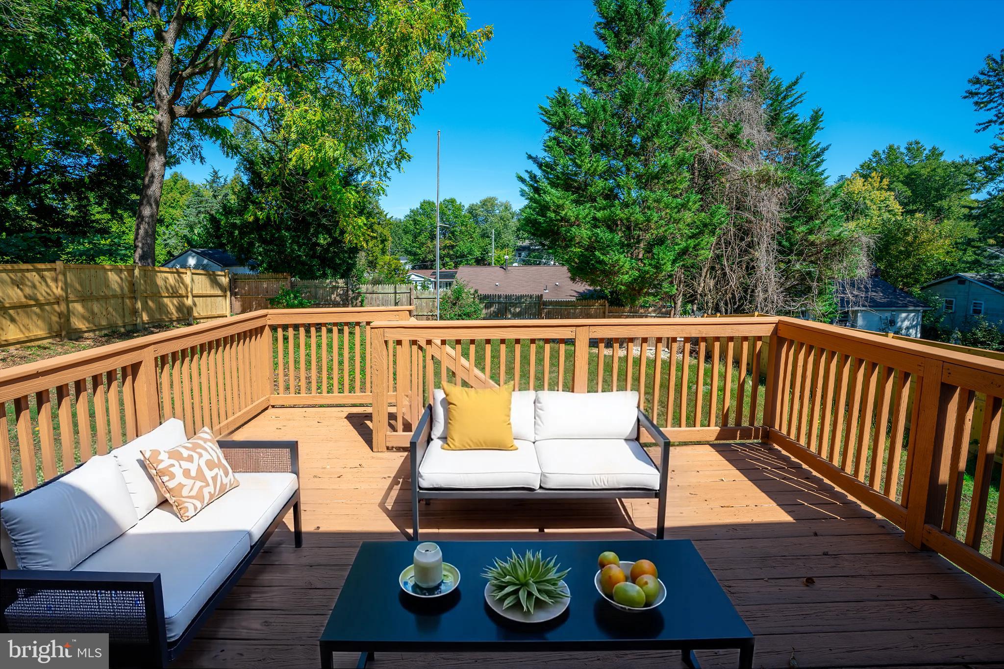 2652 Cory Terrace Silver Spring, MD 20902 - Photo 16 of 33 a view of a wooden chairs on the deck