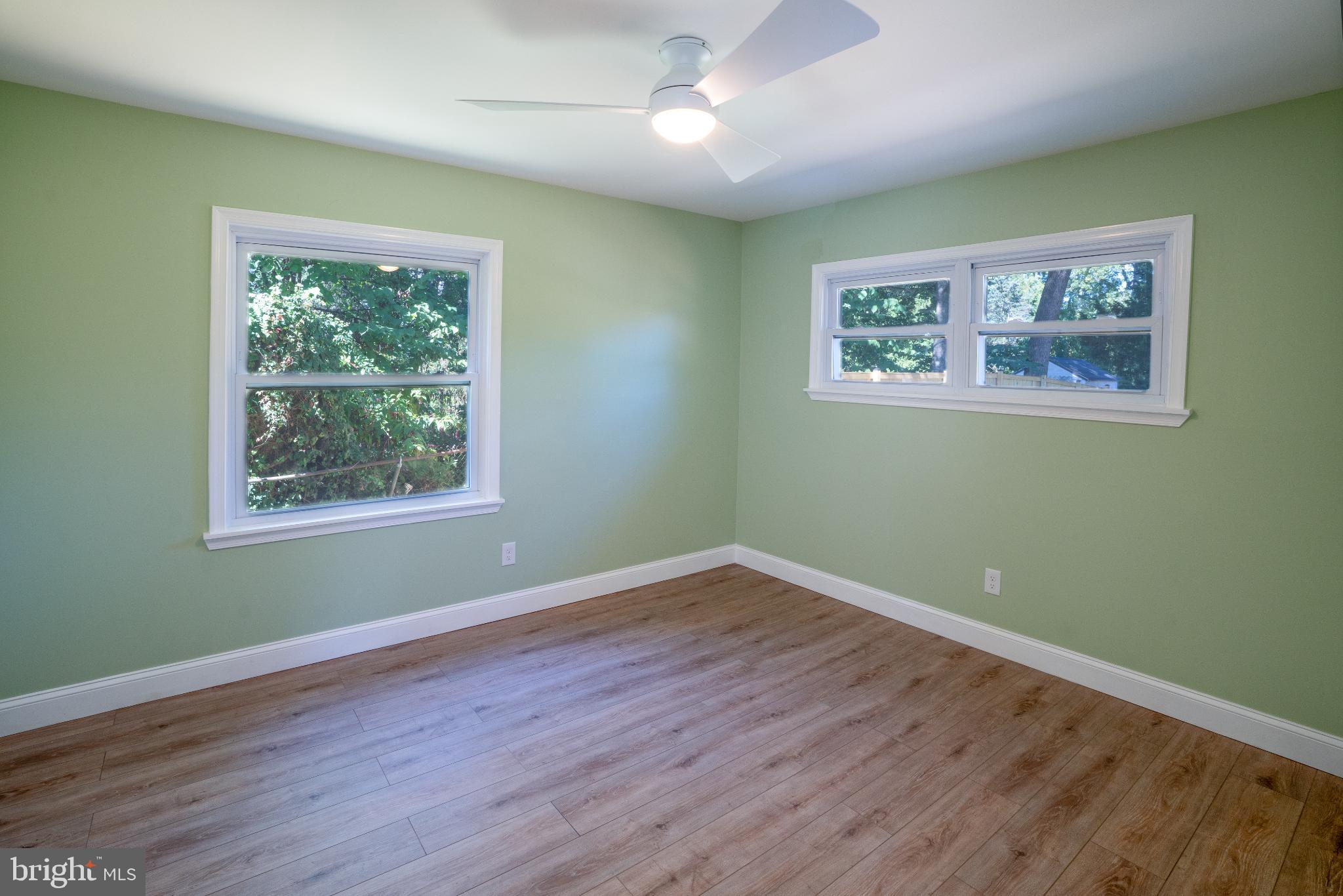 2652 Cory Terrace Silver Spring, MD 20902 - Photo 17 of 33 a view of a big room with wooden floor and windows