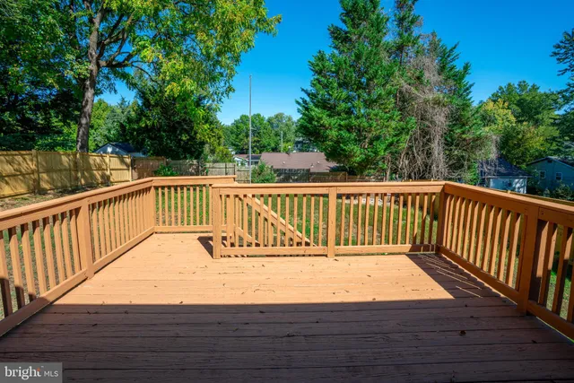 a view of balcony with wooden floor