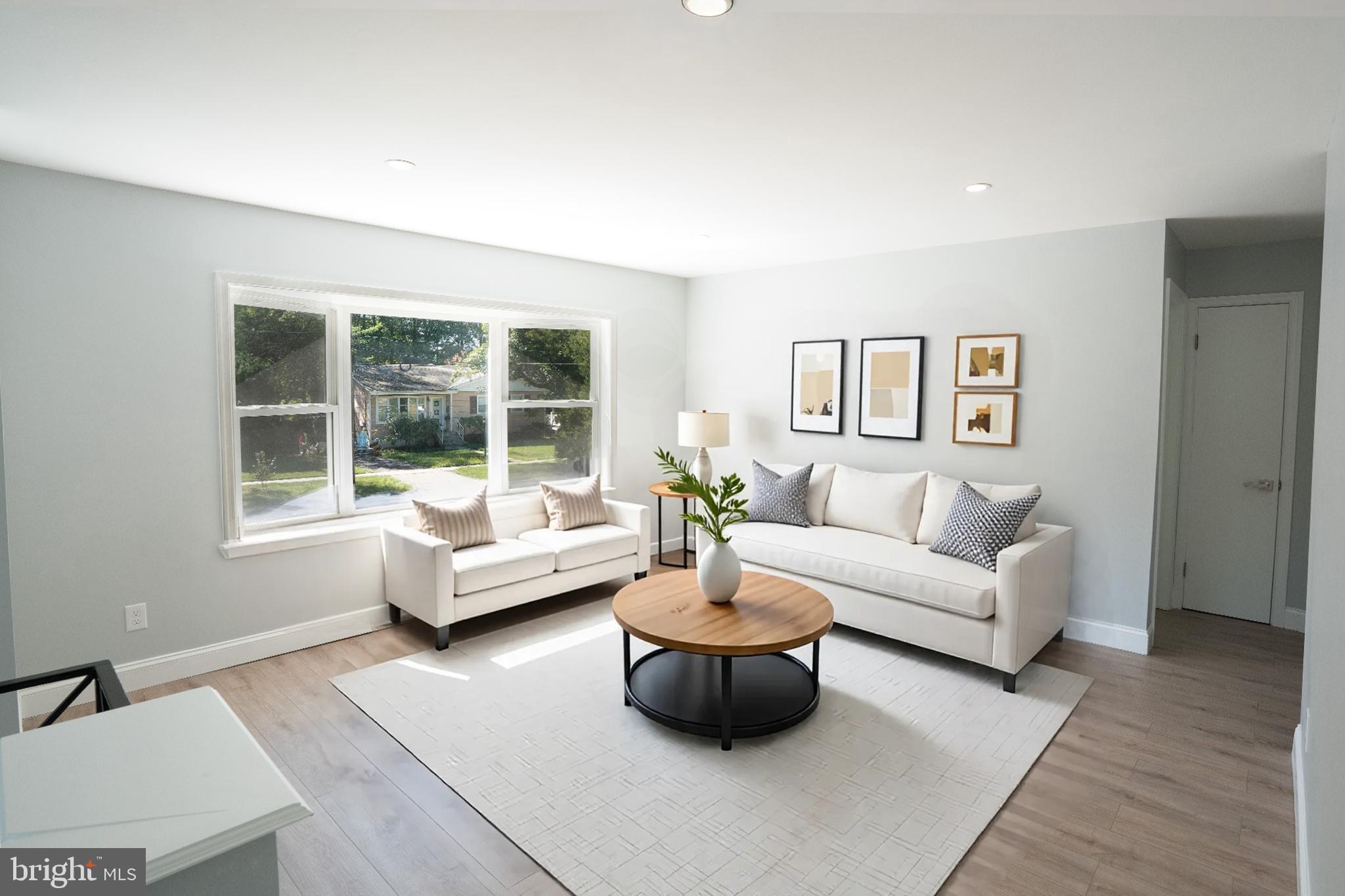 2652 Cory Terrace Silver Spring, MD 20902 - Photo 3 of 33 a living room with furniture and a large window