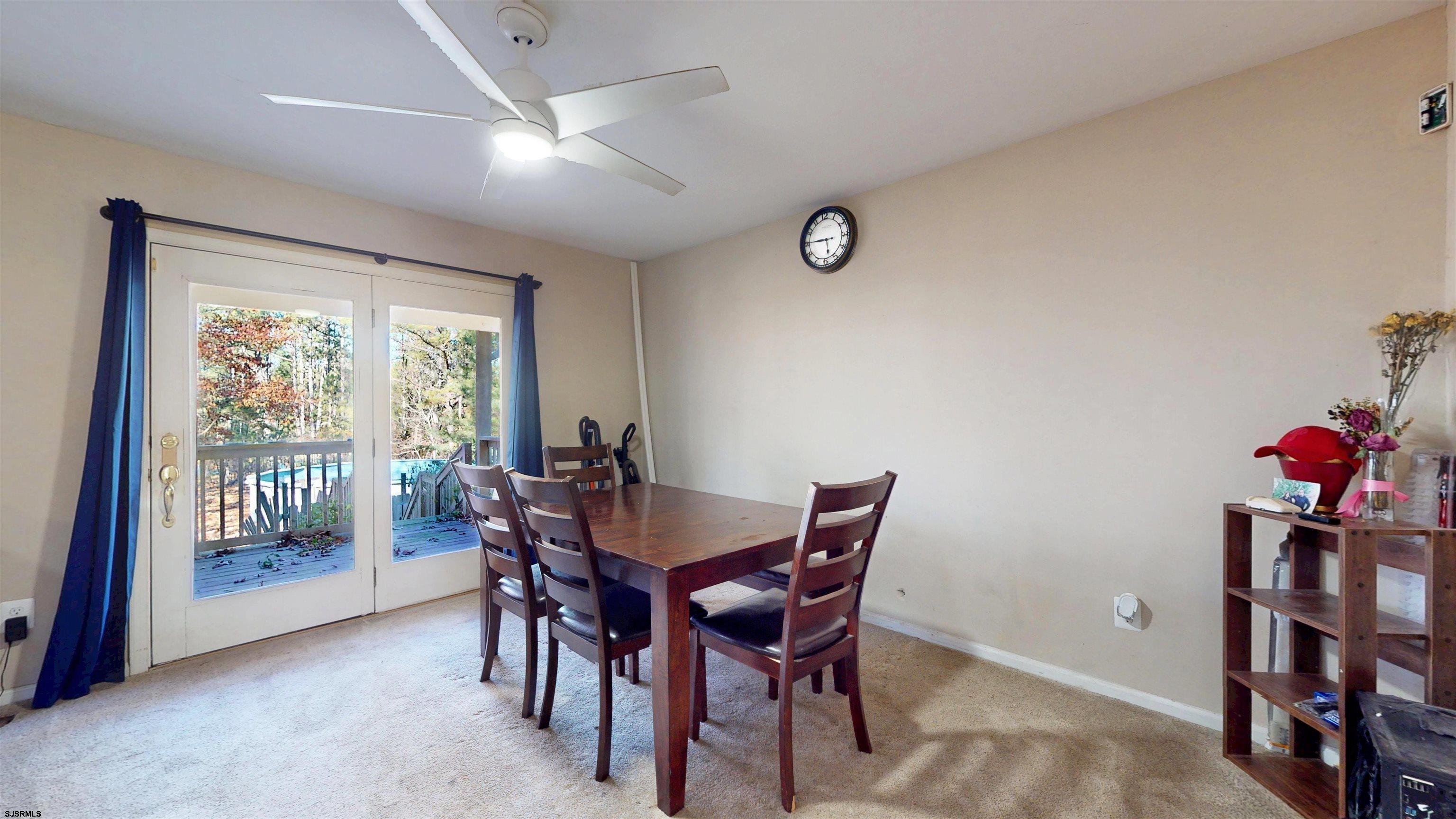 28 Luke Court Seaville, NJ 08230 - Photo 14 of 39 a view of a dining room with furniture and a window