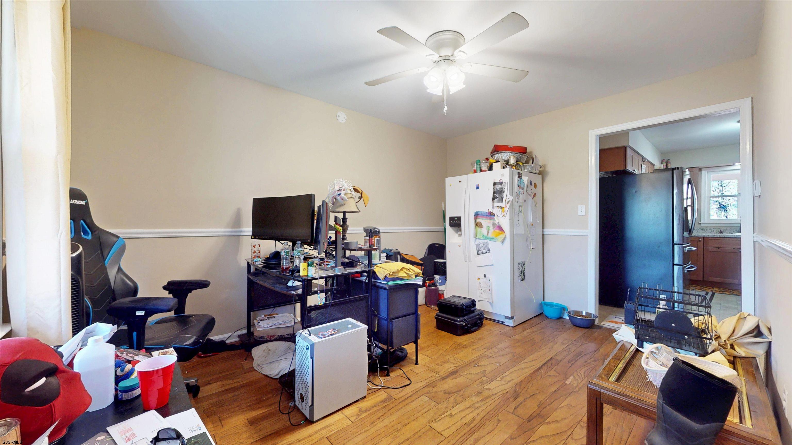 28 Luke Court Seaville, NJ 08230 - Photo 15 of 39 a living room with furniture and a flat screen tv