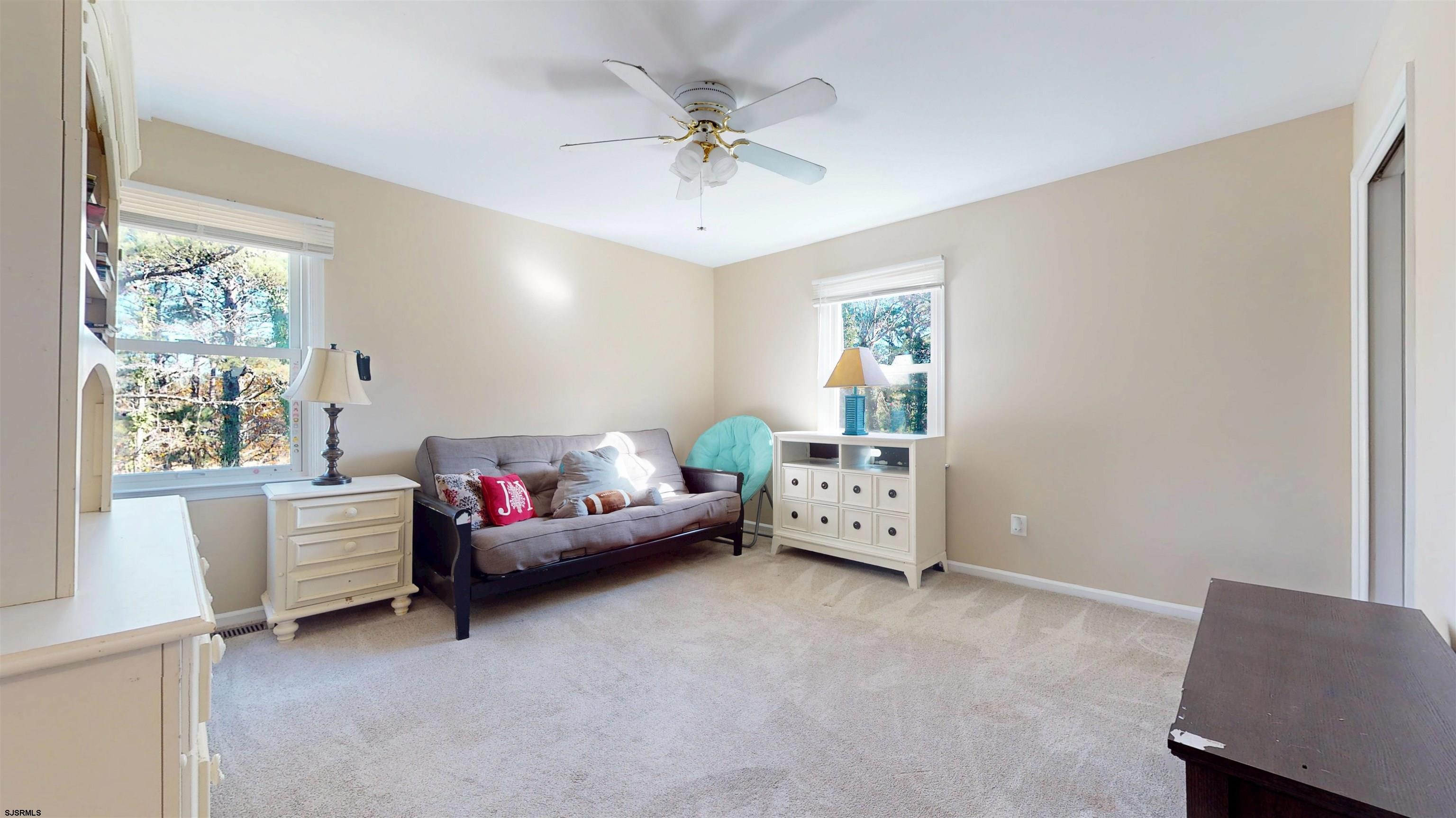 28 Luke Court Seaville, NJ 08230 - Photo 19 of 39 a living room with furniture and a window