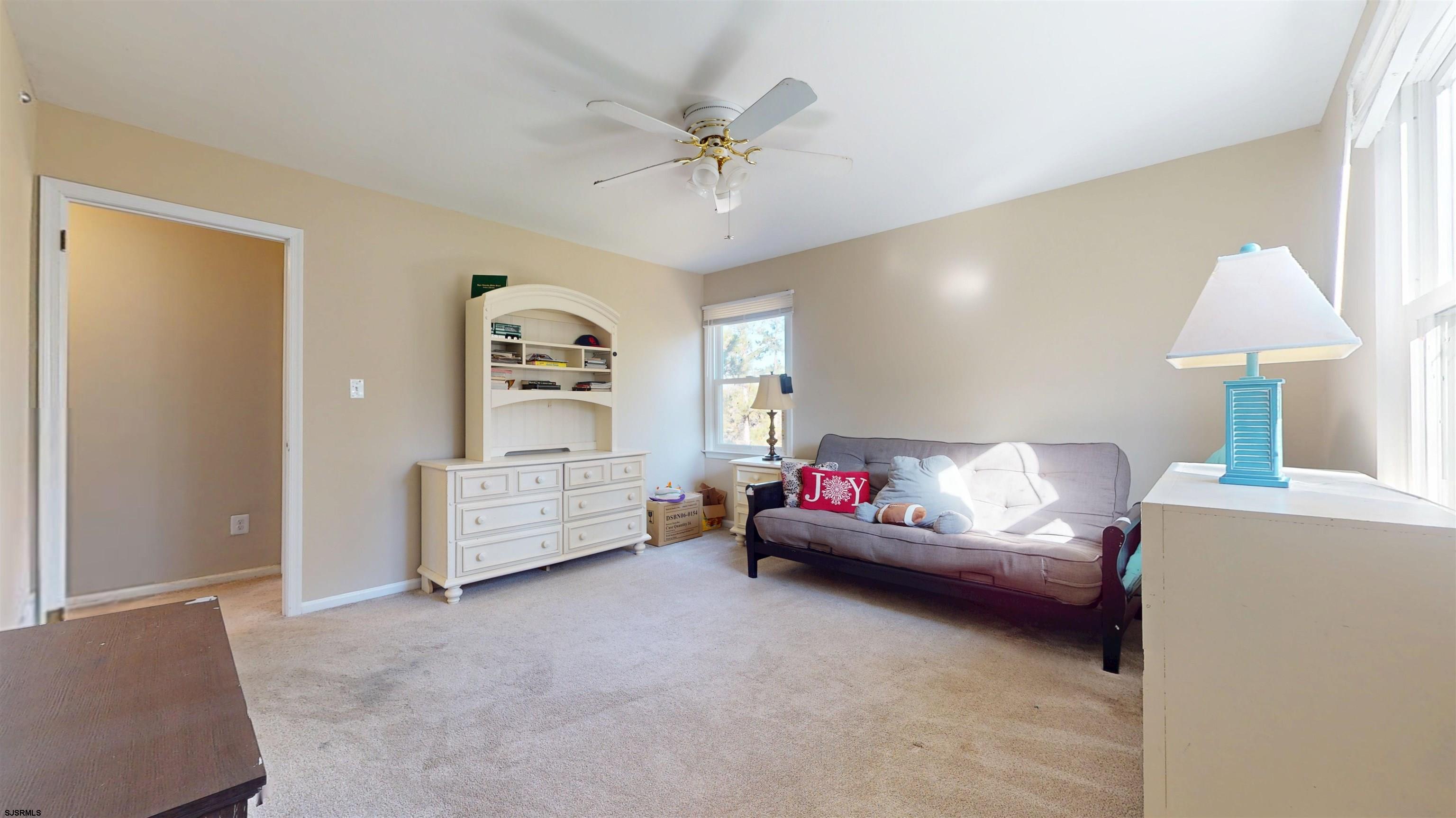 28 Luke Court Seaville, NJ 08230 - Photo 20 of 39 a living room with furniture and a window