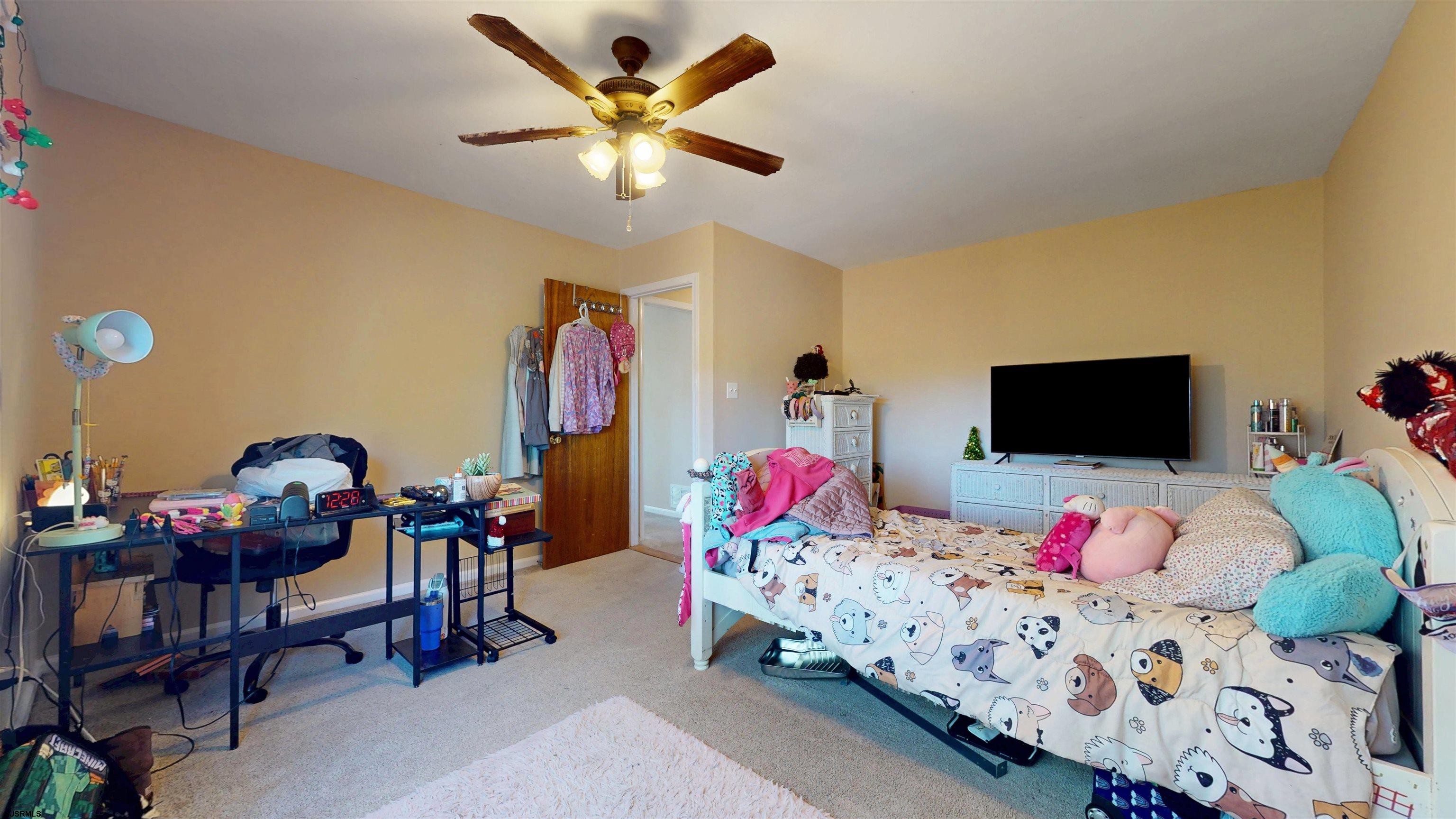 28 Luke Court Seaville, NJ 08230 - Photo 21 of 39 a bed room with a bed and a chair