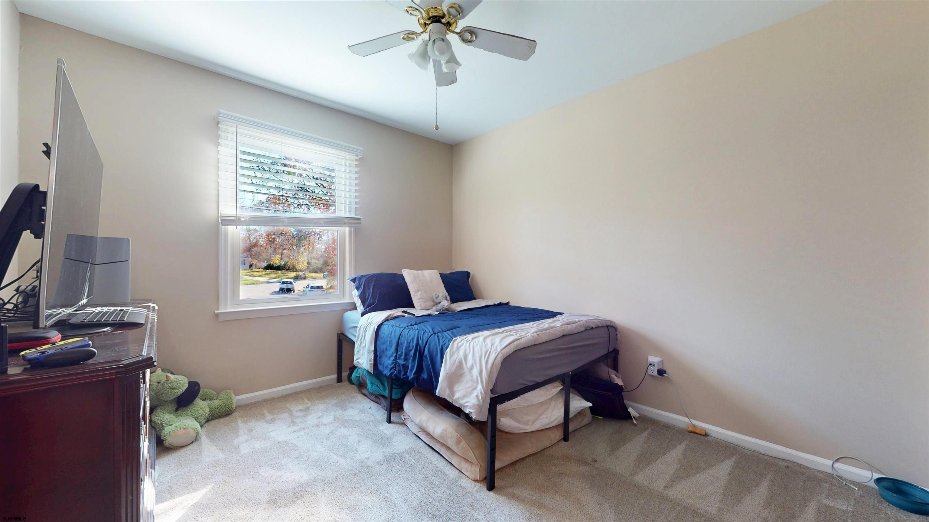 28 Luke Court Seaville, NJ 08230 - Photo 23 of 39 a bedroom with a bed and a window