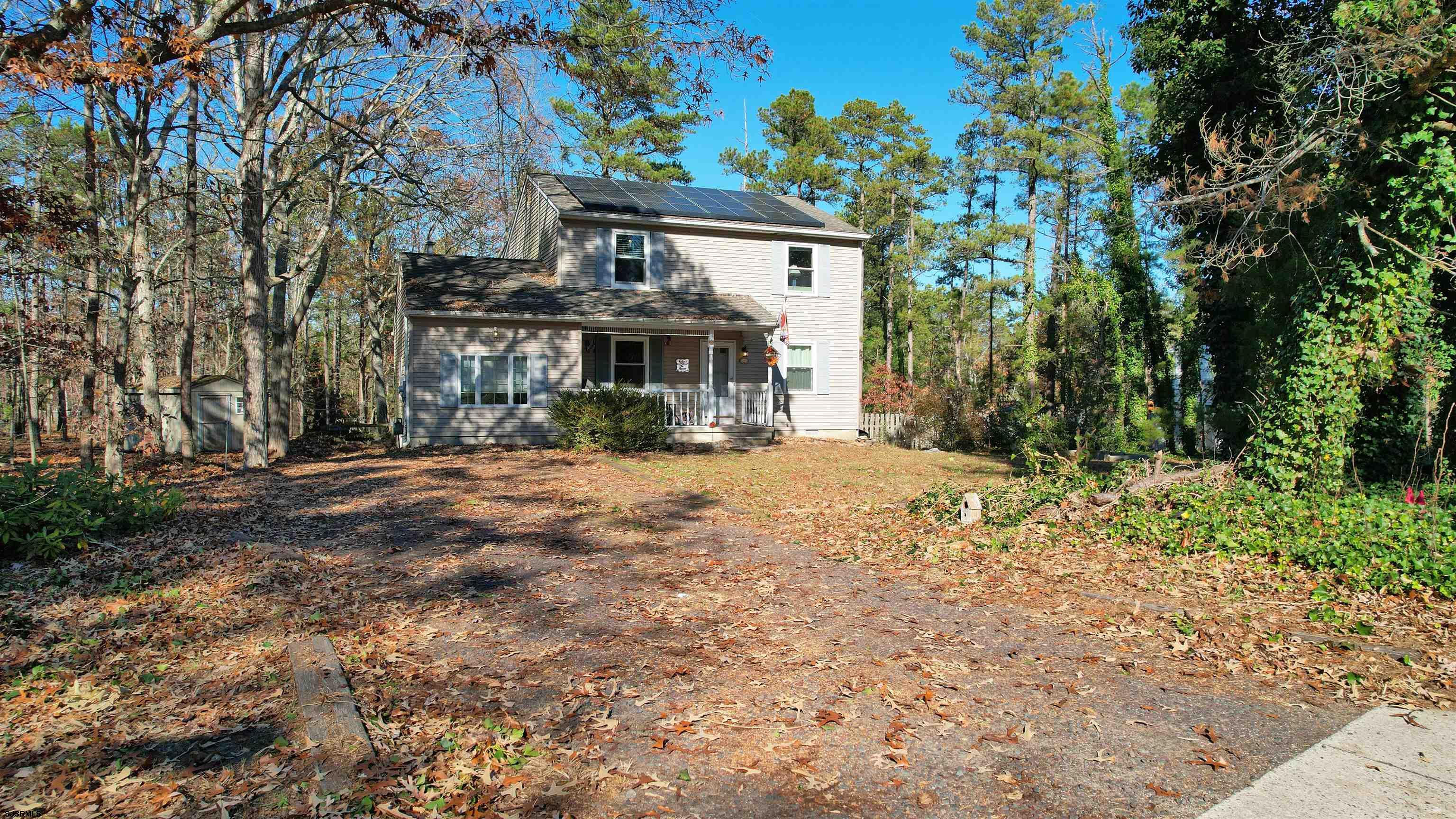 28 Luke Court Seaville, NJ 08230 - Photo 35 of 39 a view of house with outdoor space and trees