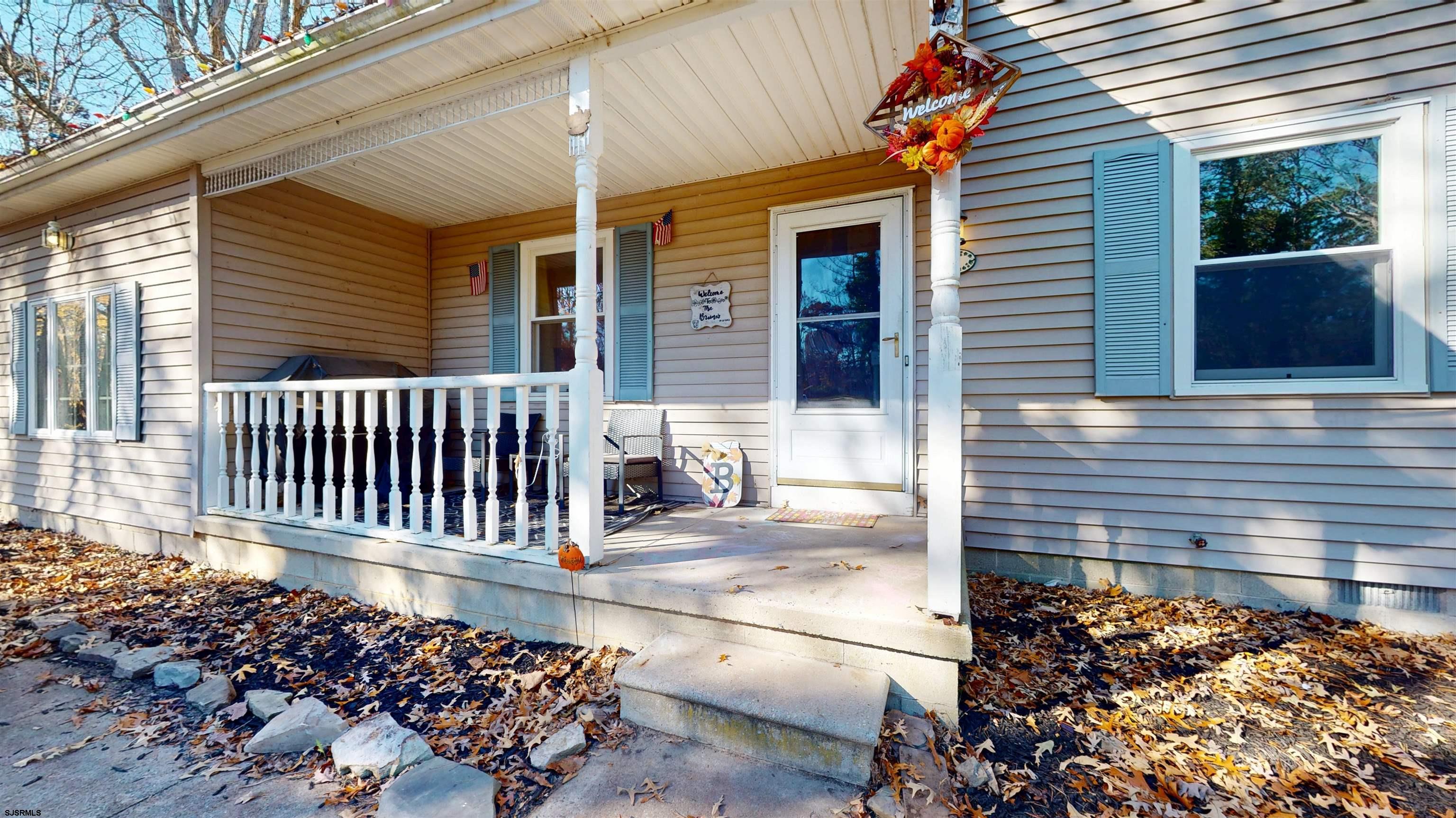 28 Luke Court Seaville, NJ 08230 - Photo 36 of 39 a view of a porch with a bench