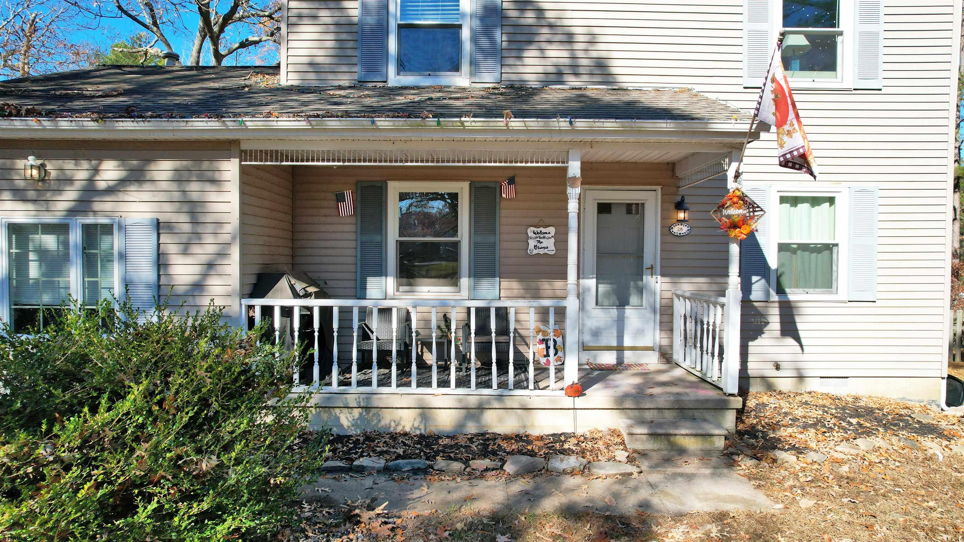 28 Luke Court Seaville, NJ 08230 - Photo 38 of 39 a view of a house with a small yard and wooden floor and fence