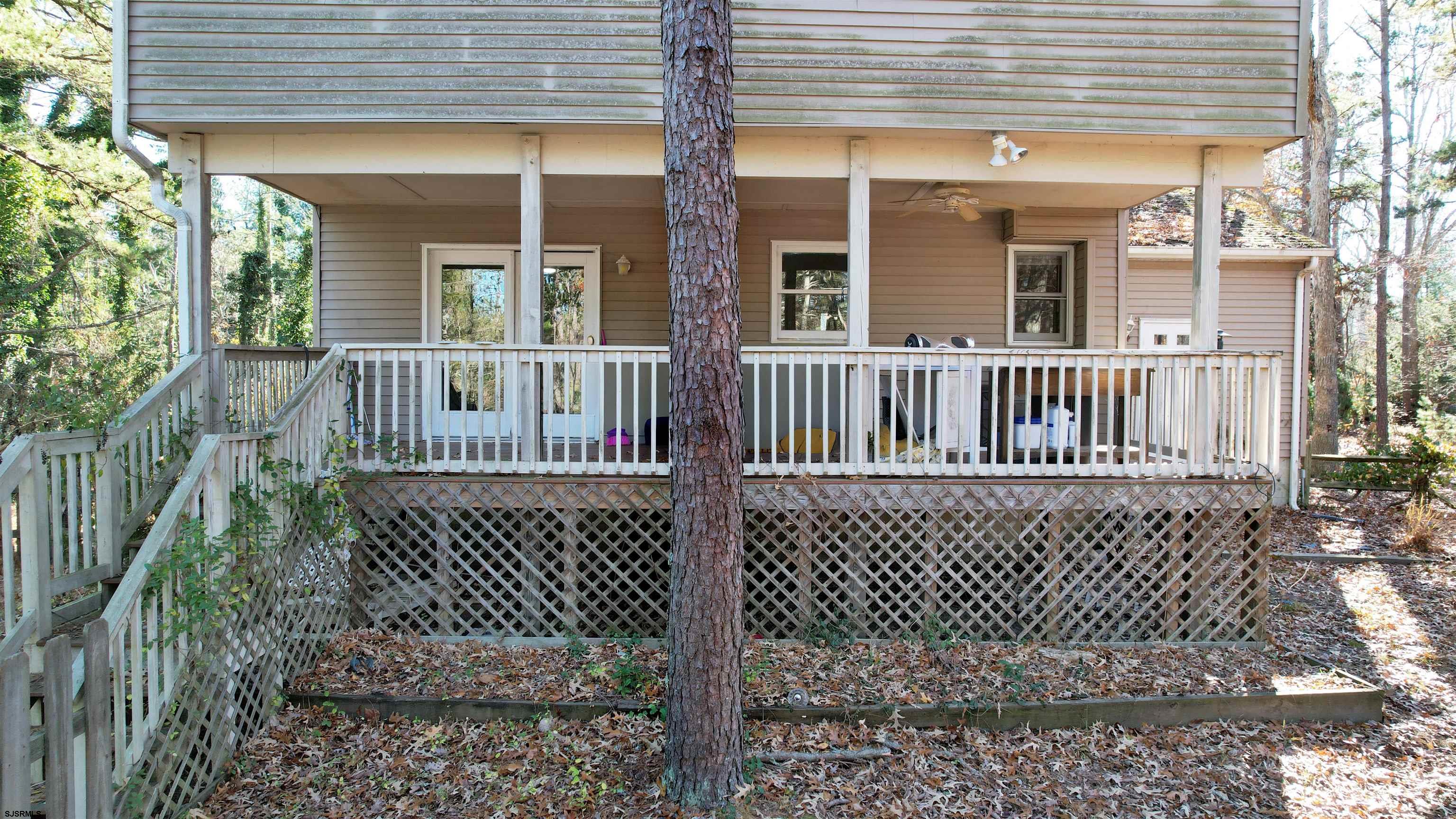28 Luke Court Seaville, NJ 08230 - Photo 4 of 39 a view of a deck with a fence