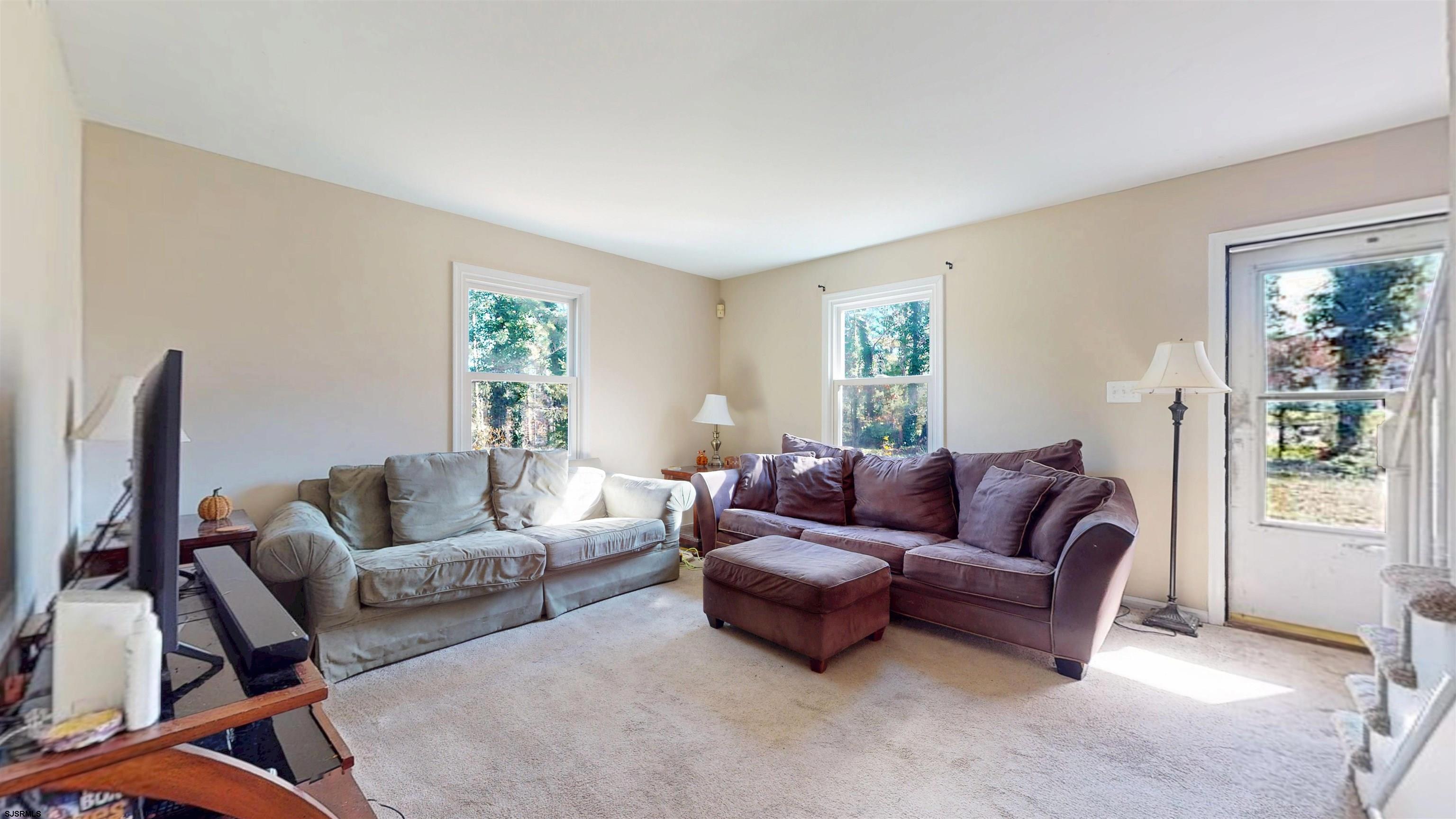 28 Luke Court Seaville, NJ 08230 - Photo 7 of 39 a living room with furniture and a window