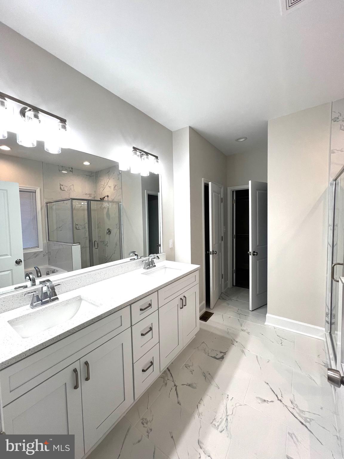 Tbd Lot 31 Tbd Colonial Beach, VA 22443 - Photo 20 of 53 a spacious bathroom with a granite countertop sink mirror and double