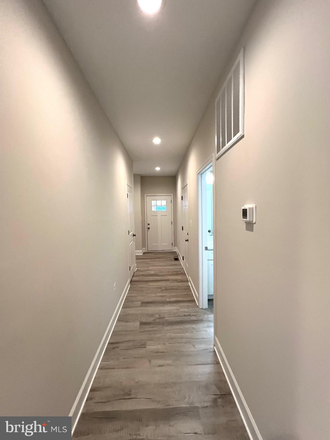 Tbd Lot 31 Tbd Colonial Beach, VA 22443 - Photo 27 of 53 a view of a hallway with wooden floor and staircase