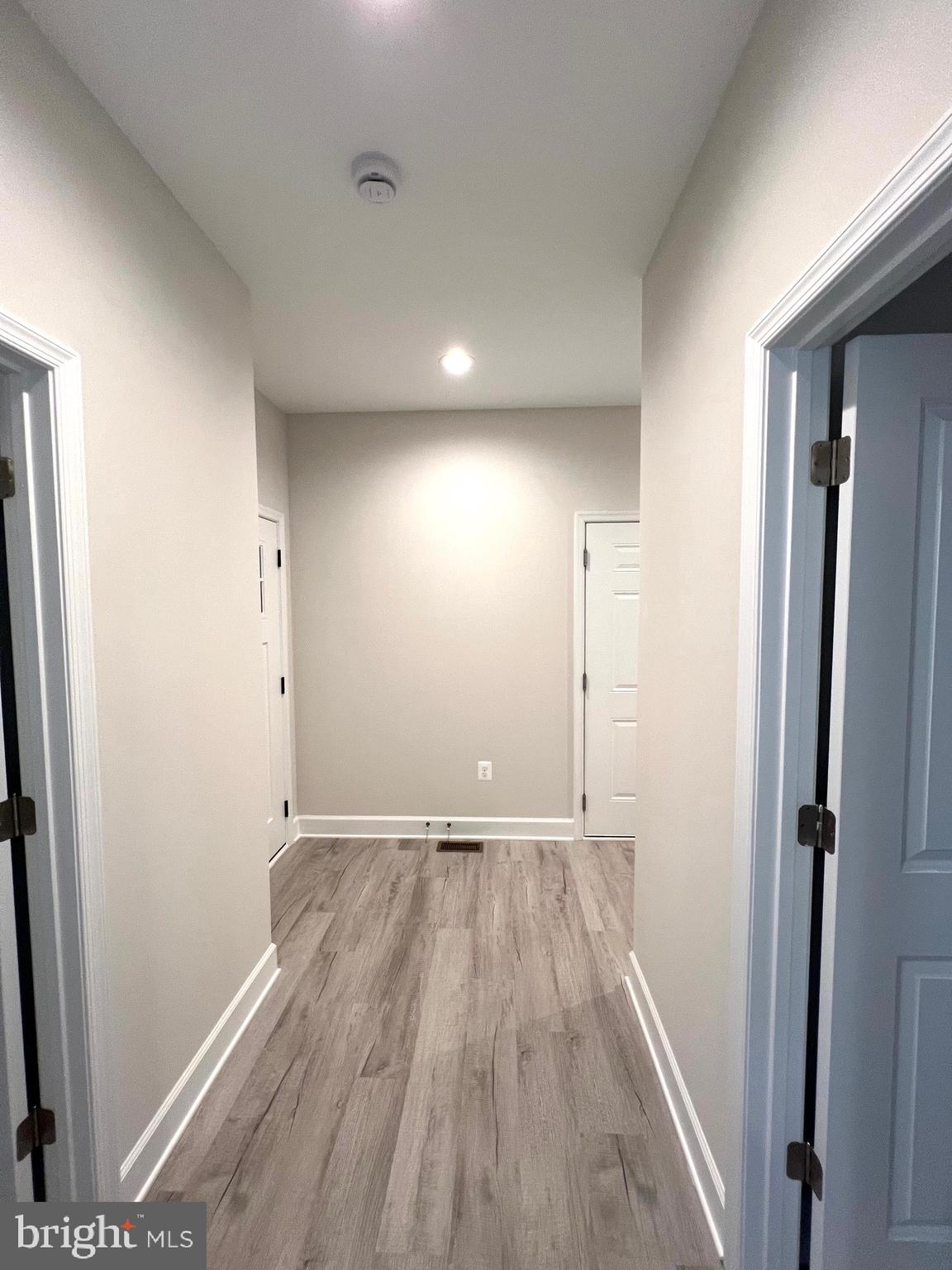 Tbd Lot 31 Tbd Colonial Beach, VA 22443 - Photo 28 of 53 wooden floor in an empty room with a window