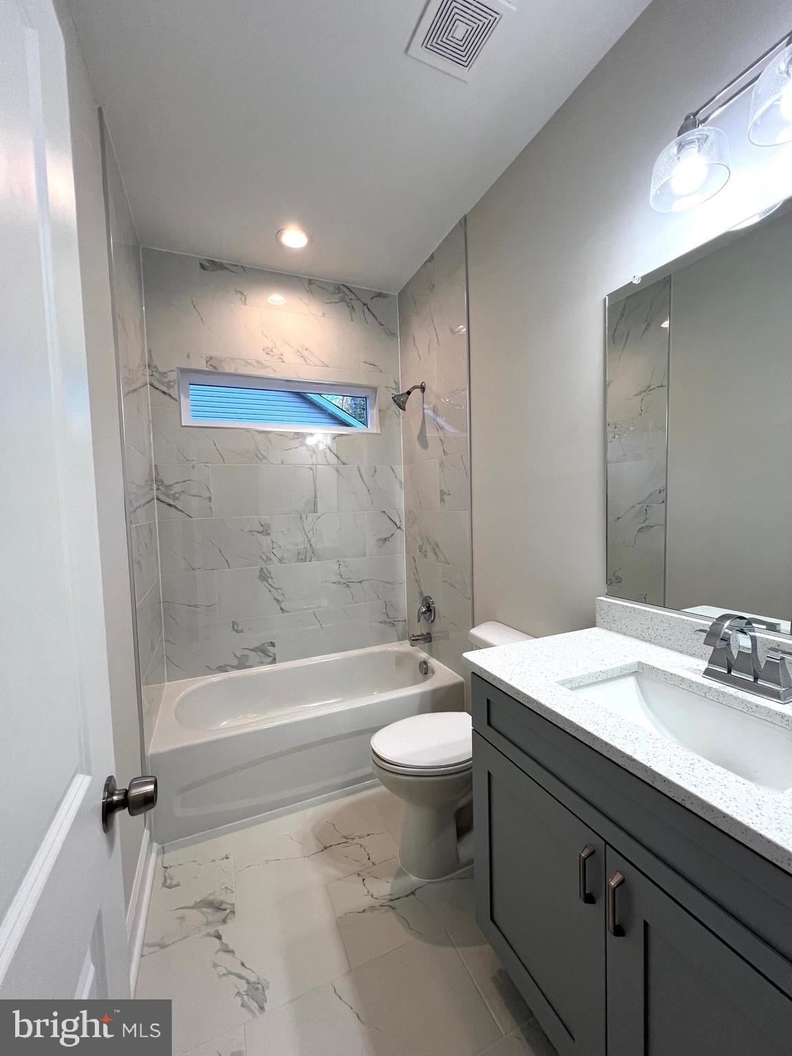 Tbd Lot 31 Tbd Colonial Beach, VA 22443 - Photo 35 of 53 a bathroom with a sink a toilet a mirror and bathtub