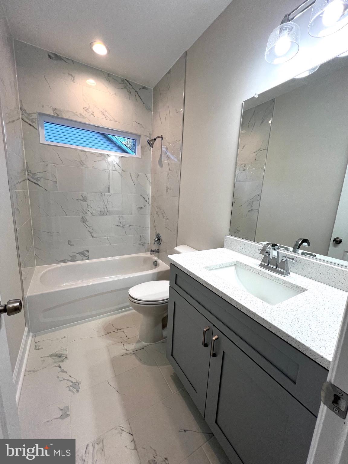 Tbd Lot 31 Tbd Colonial Beach, VA 22443 - Photo 36 of 53 a bathroom with a granite countertop sink a toilet and bathtub