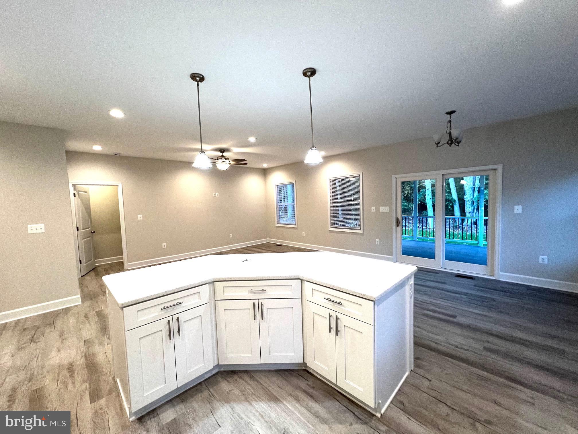 Tbd Lot 31 Tbd Colonial Beach, VA 22443 - Photo 10 of 53 a kitchen that has a sink a stove and a wooden floor