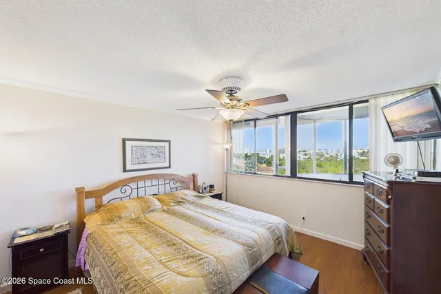 a wooden bench sitting in the middle of a building