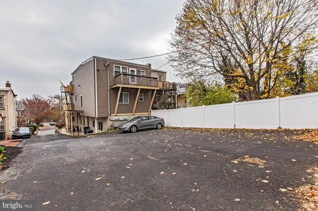 a view of a street with cars
