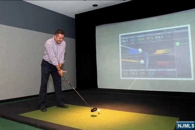 a room with a table and a potted plant