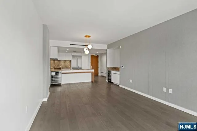 a view of kitchen with wooden floor