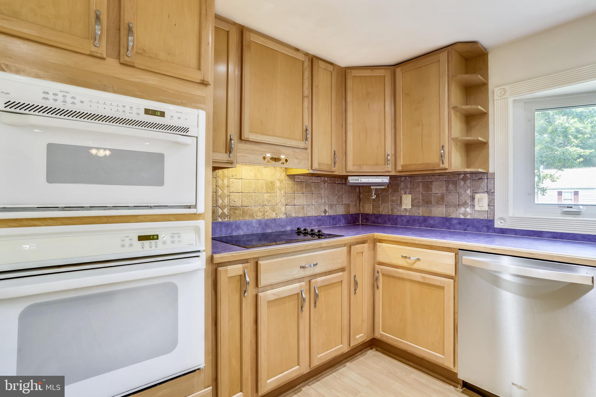 9525 Burning Branch Road Burke, VA 22015 - Photo 22 of 55 Kitchen has a bit of whimsy with pastel counters