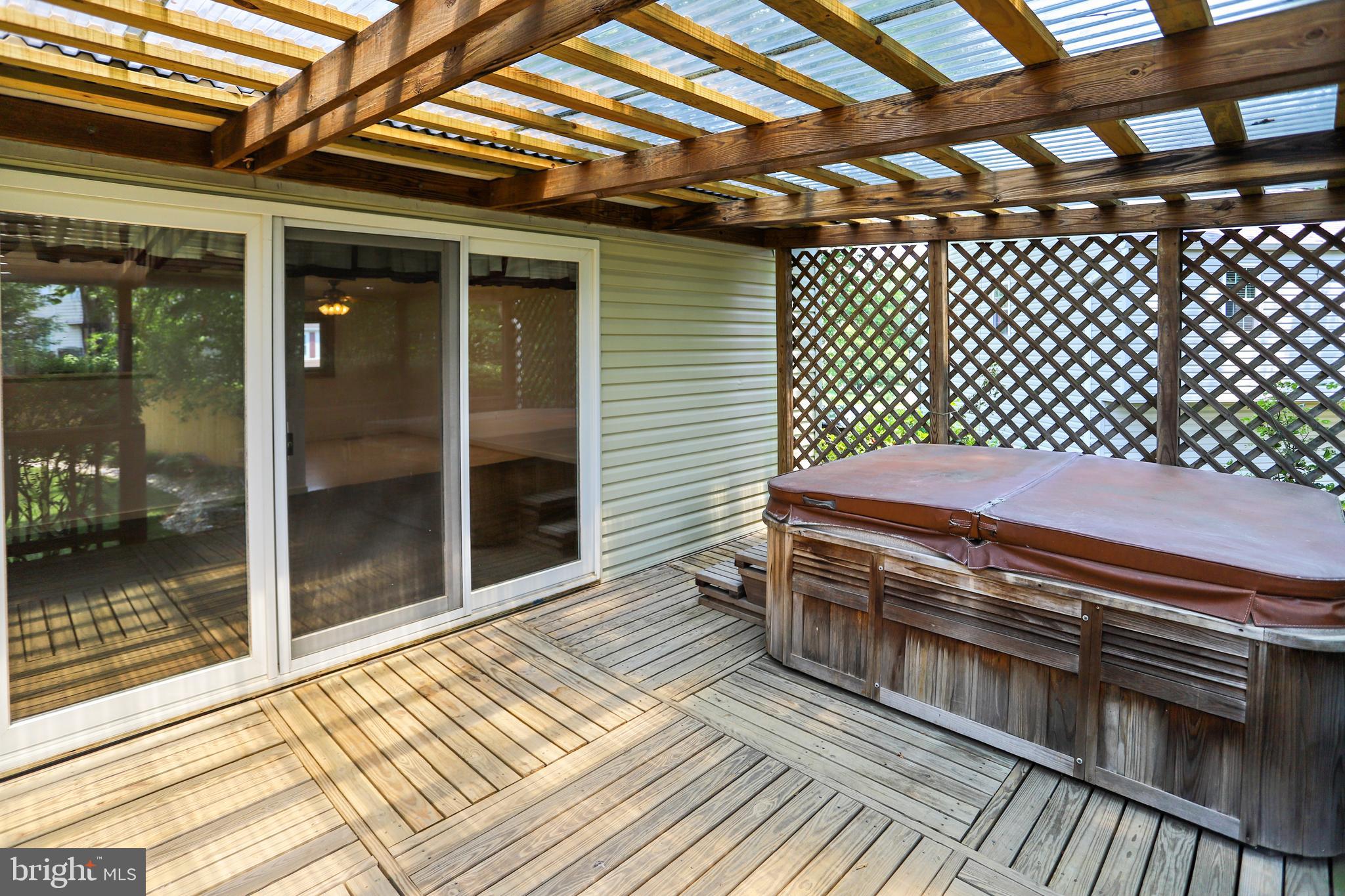 9525 Burning Branch Road Burke, VA 22015 - Photo 49 of 55 Lightly shaded back deck has hot tub