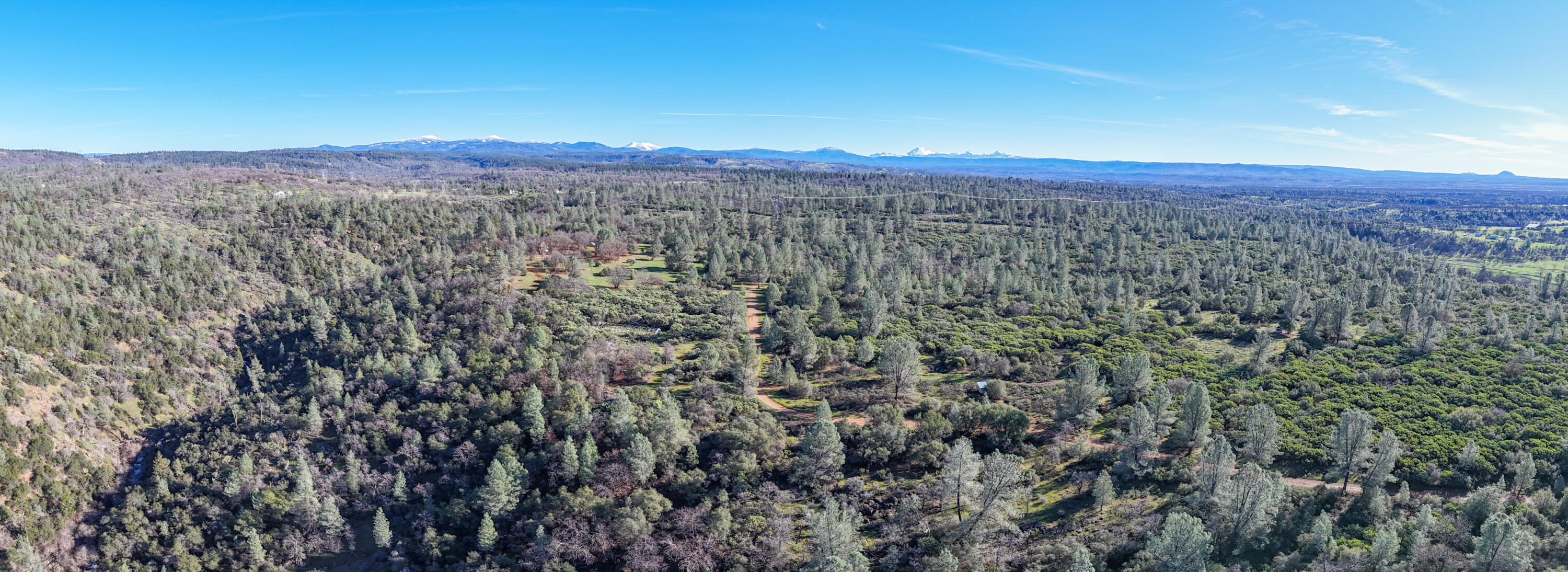 **** Western Whitehouse Way Oak Run, CA 96069 - Photo 9 of 18 a view of a city with mountains in the background