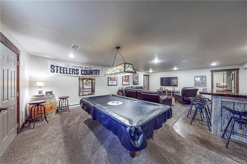 127 Miller Lane Road Waynesburg, PA 15370 - Photo 22 of 25 Huge game room to host plenty of Steelers games.