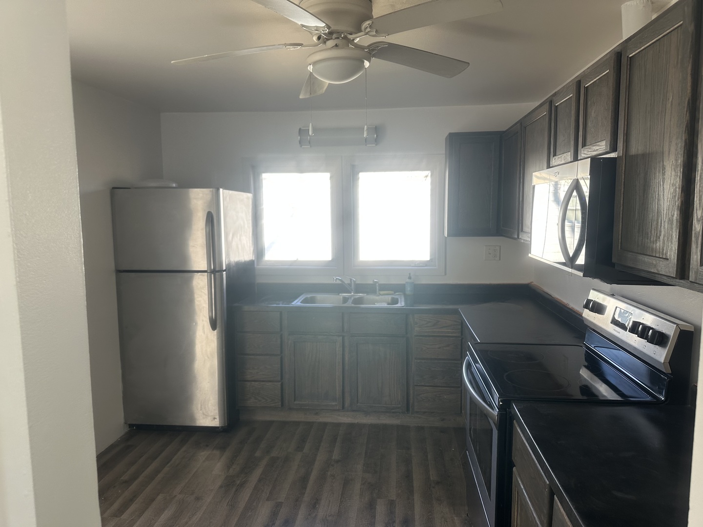 410 Ivanhoe Road Grayslake, IL 60030 - Photo 2 of 9 a kitchen with a refrigerator and a sink