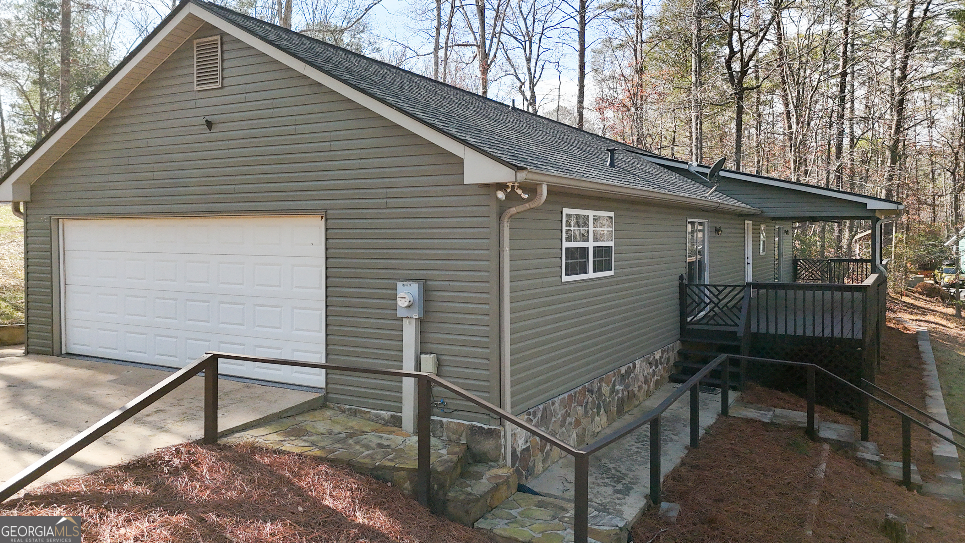 499 Old Deer Path Way Cleveland, GA 30528 - Photo 21 of 26 a view of a house with a wooden deck and furniture
