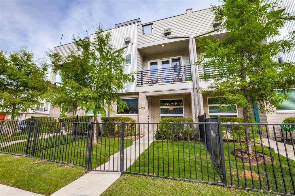 4785 Asher Place Dallas, TX 75204 - Photo 1 of 30 a view of a house with a small yard and a large tree